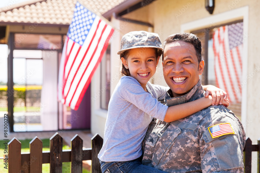 A service member welcomed home by their family